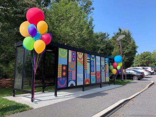 Welcome balloons in assorted sizes at bus stop