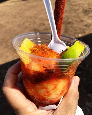 Mango Sorbet with Chamoy, Tsjin, fresh lime, and fresh mango.  So goood