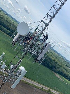 Crew on Guy Tower 
 Cell Tower Construction