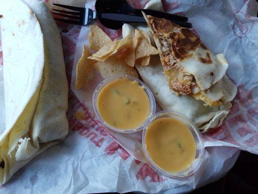 big freaking burrito, big freaking chicken quesadilla, chips with cheese.