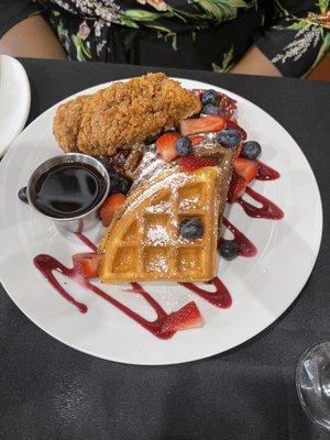 Seasoned fried chicken with waffles.