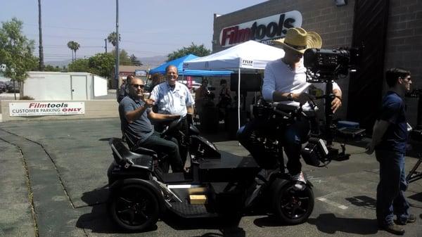 Mark standing by a vehicle built for shooting with a Steadi-Cam