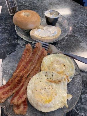 Eggs, bacon and bagel.