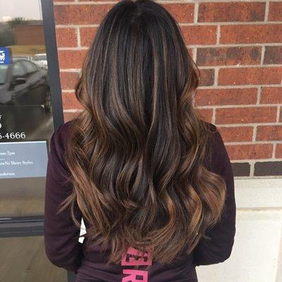 Caramel balayage with long layers haircut