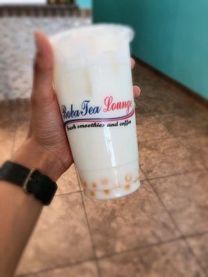 Coconut bubble tea with passion fruit bubbles