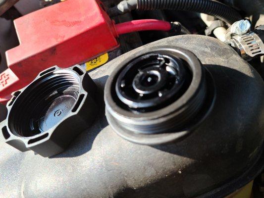 Broken radiator cap from overtightening. This was difficult to remove and replace.