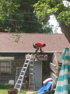 Jeremiah working on the garage