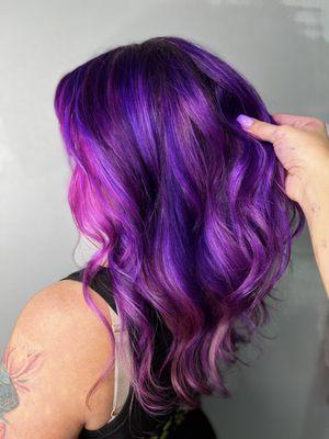 Gorgeous wild orchid purple accentuated with pops of fashionable magenta for a festive mermaid look.