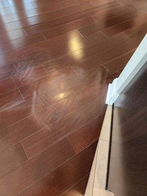 #2 picture of damage done by painters to dark walnut floors