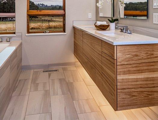 Toekick lighting on a floating vanity. This makes a bathroom safe to use at night.