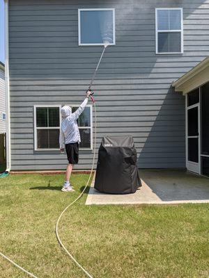 Pressure washing siding, screen porch, patio