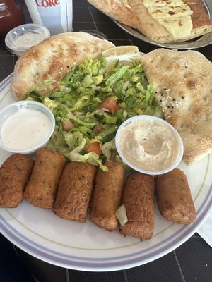 Falafel plate with hummus and yogurt suave and salad