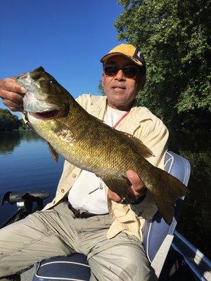 Alex with a beast of a smallmouth. 23 1/4 " 5lbs 10ozs