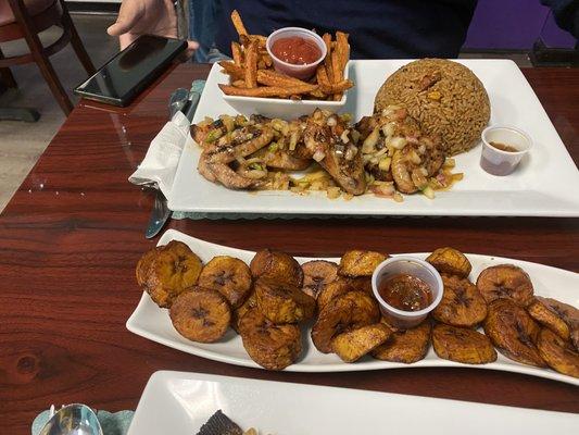 French Fries Liberian style rice with chicken wings.