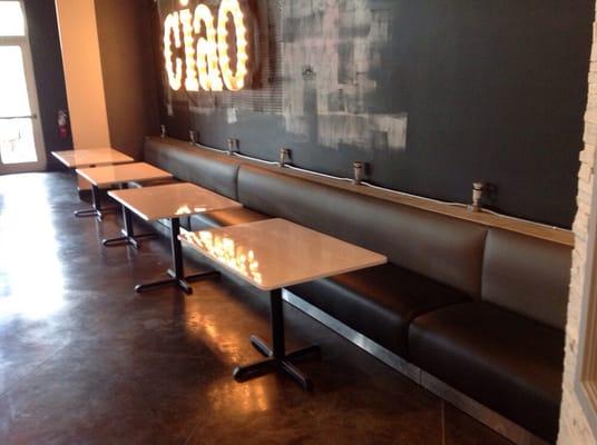 Existing seating, cut down and reupholstered on site to match the new booths we custom built. All before the restaurant opened!!