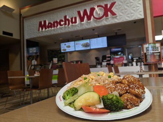 Fresh vegetables, fried rice, and honey garlic chicken at Manchu WOK!