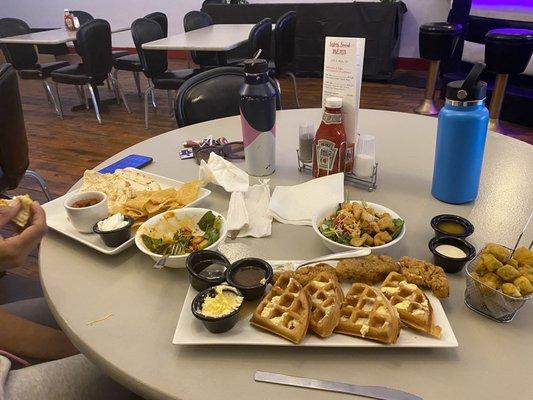 Chicken & waffles, Fried okra, Chicken Quesadilla with side Salads.