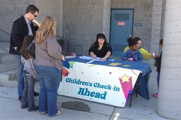 Kids check in table.