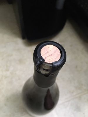 Top of the cork is stained with wine