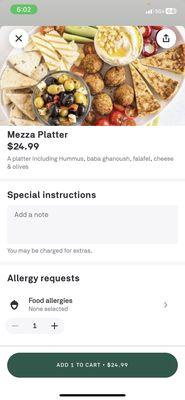 Advertised Mezza Platter -- focus on olive and feta dish