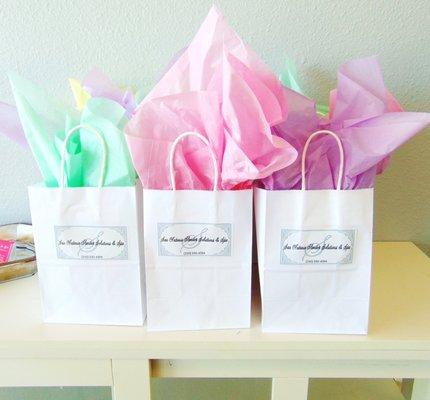 Gift Bags from the mother's and mimosa's event. Now they give it out to new customers.