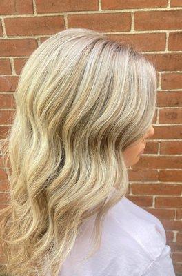 Highlights at the root toned to a icy blonde.