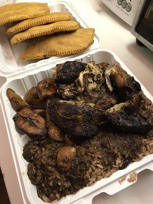 Large jerk chicken, rice and peas, plantain with oxtail gravy ($11) Ft. Beef patties from Jamaican Pride