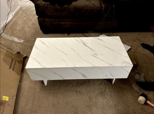 Built this coffee table for a customer that could not do it charged a cheap price and helped them out