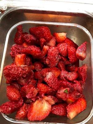 Soggy strawberries with mold