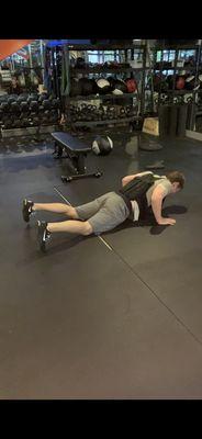 Cort from Pop's getting in a couple punishment burpees with the weighted vest after a competition with his client.