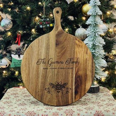 Custom engraved wood cutting board. Awesome personalized gift.