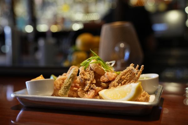 Happy Hour Crispy Calamari. Happy Hour is Tuesday - Friday 3:00pm - 6:00pm