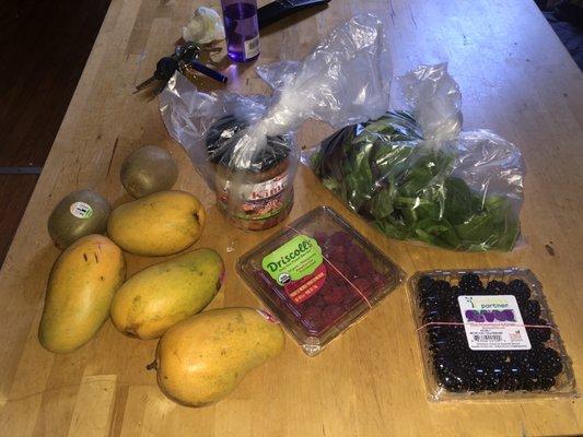 $15 well spent. Organic raspberries, kimchi, 4 mangoes, 2 kiwis, blackberries, & spring mix/spinach.