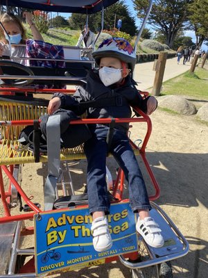 My lil lovie on his bike ride