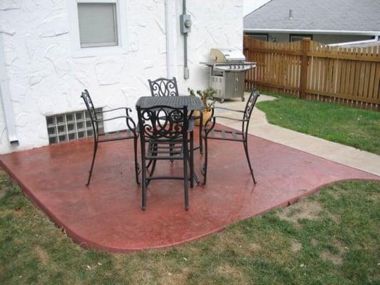 Colored and Stamped concrete patio by LaMere