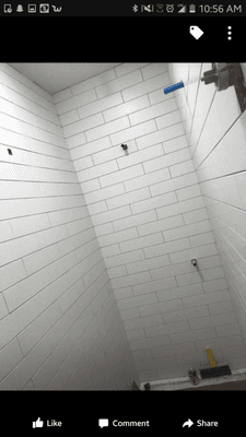 Sleek white 4x16 subway shower wall tile