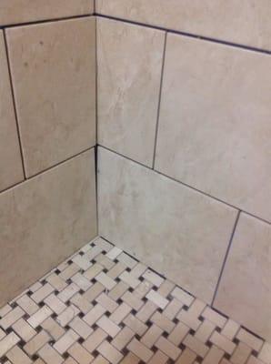 Huge gap in shower wall.