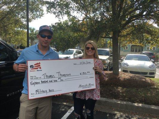 Active military member and his wife! Wow look that check!