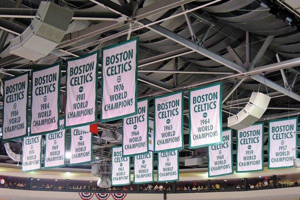 The Boston Celtics have won 17 NBA titles, tied with the Los Angeles Lakers. They have a lot of championship banners inside TD Garden.