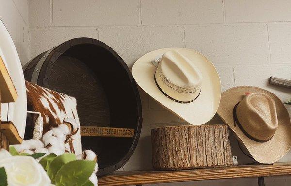 Custom made whiskey & Wine Designs, cowhide rug & cowboy hats.