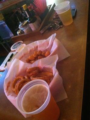 Yummy onion rings, cheese curds, and Blue Moon!