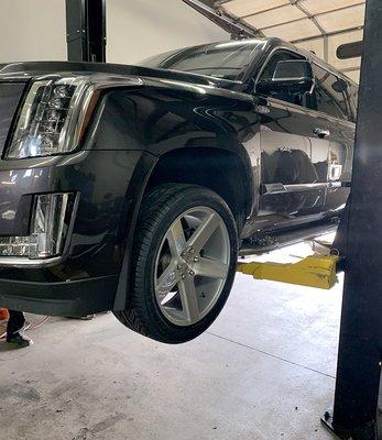 My truck on the lift at Waters Auto Repair