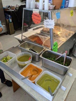 Their salsa/topping station is inside the grocery store.