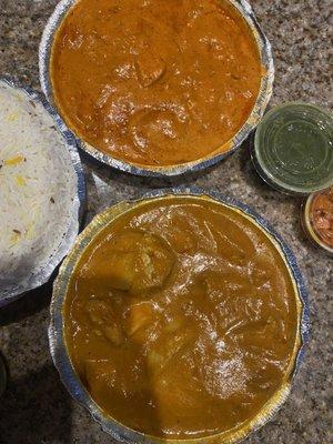 Butter chicken, chicken madras and rice. This green sauce is so good too!!