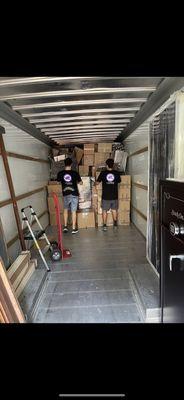 Our crew efficiently packing a truck.