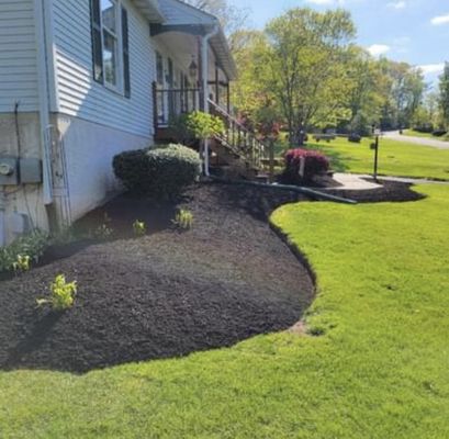 Spring cleanup with mulch installation