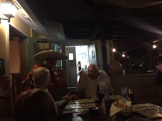 Grandma being serenaded by Ranchero singer