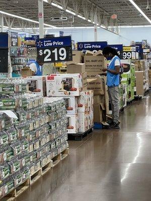 This is the average Walmart employee here. They've been looking at their phones the whole time.