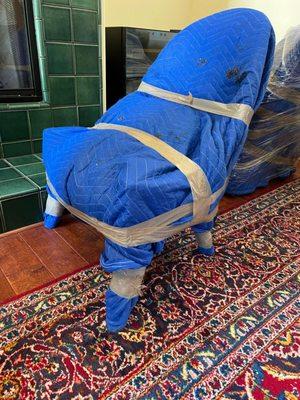 We wrap the furniture in moving blankets and then wrap them in heavy-duty shrink film to ensure they don't get damaged during transportation