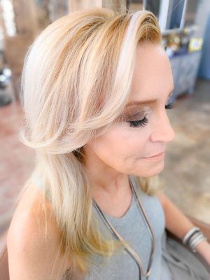 Blow me Blowout & brown smokey eye with a soft natural strip lash done by Erika.